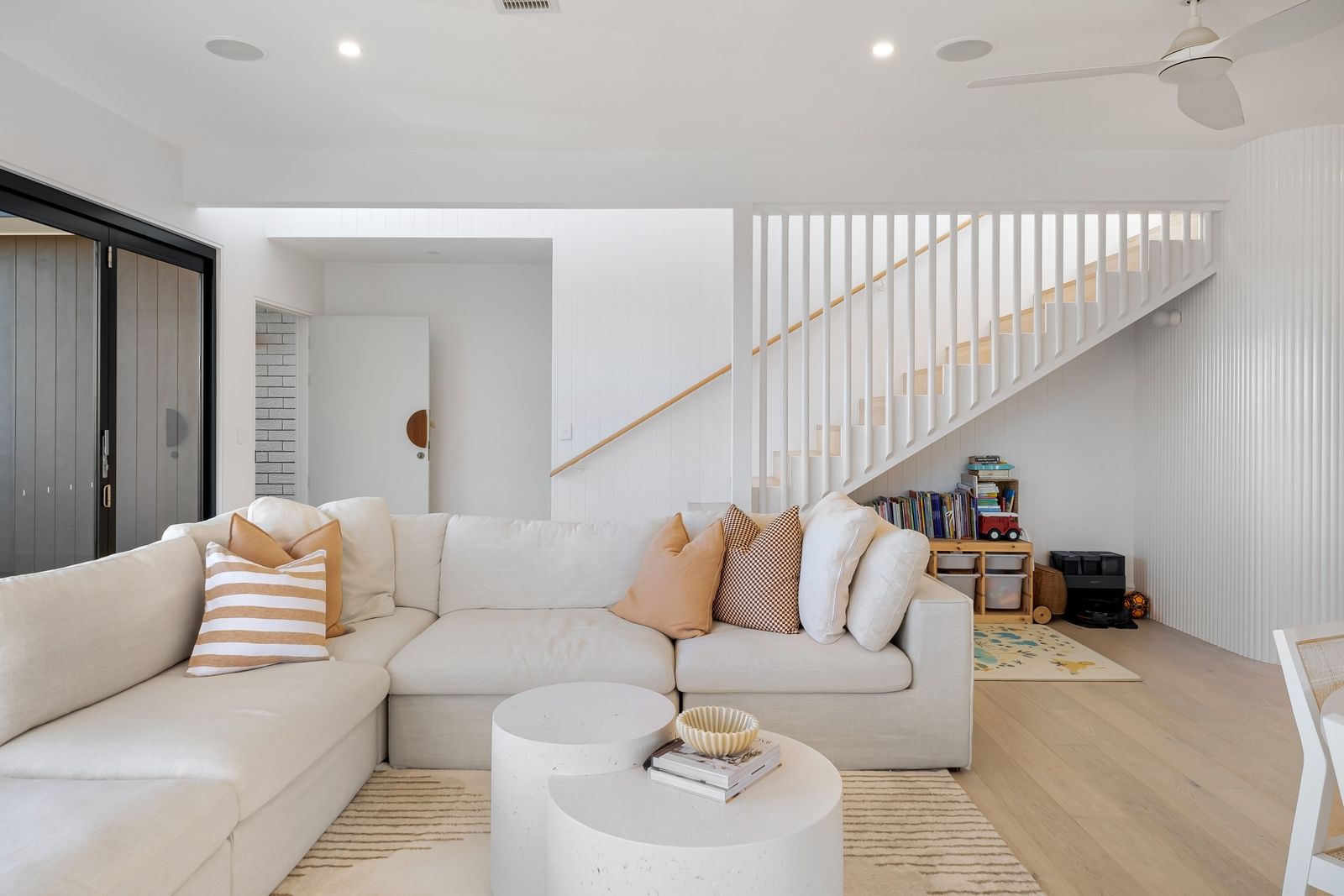 Bright contemporary interior with clean white walls and ceilings. Stock inspiration photograph by Lisa Anna; not an All Plastering Solutions project.